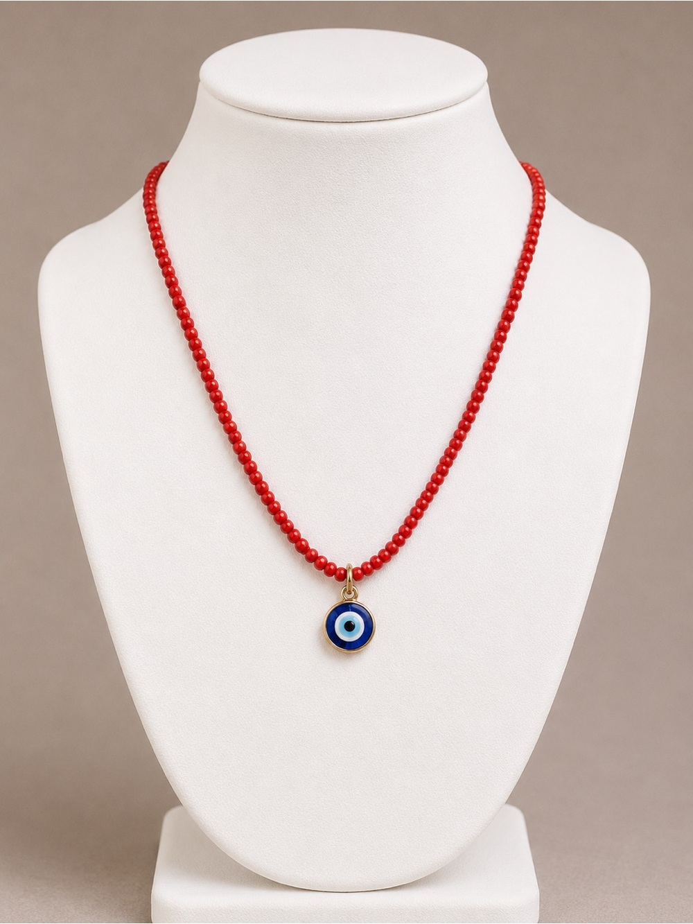 Red Beaded Necklace with Blue Evil Eye Pendant